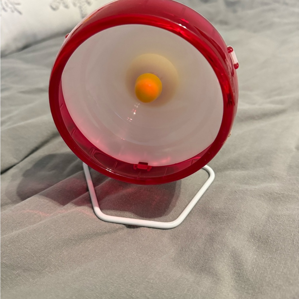 Red and White Circular hamster wheel